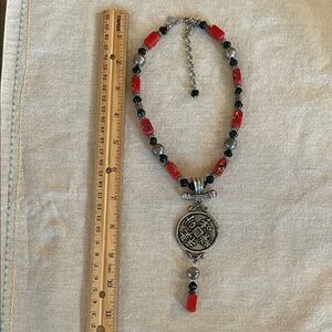 Red and Black Beaded Necklace with Silver Chinese Coin Pendant